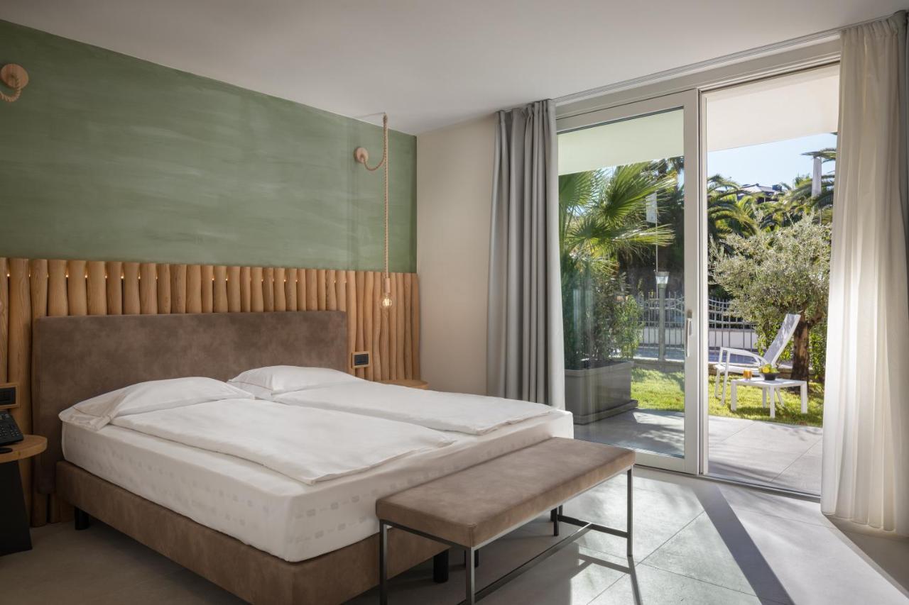 Aris Apartments & Sky Pool - Tonelli Hotels - Adult Friendly 加尔达湖滨 客房 照片